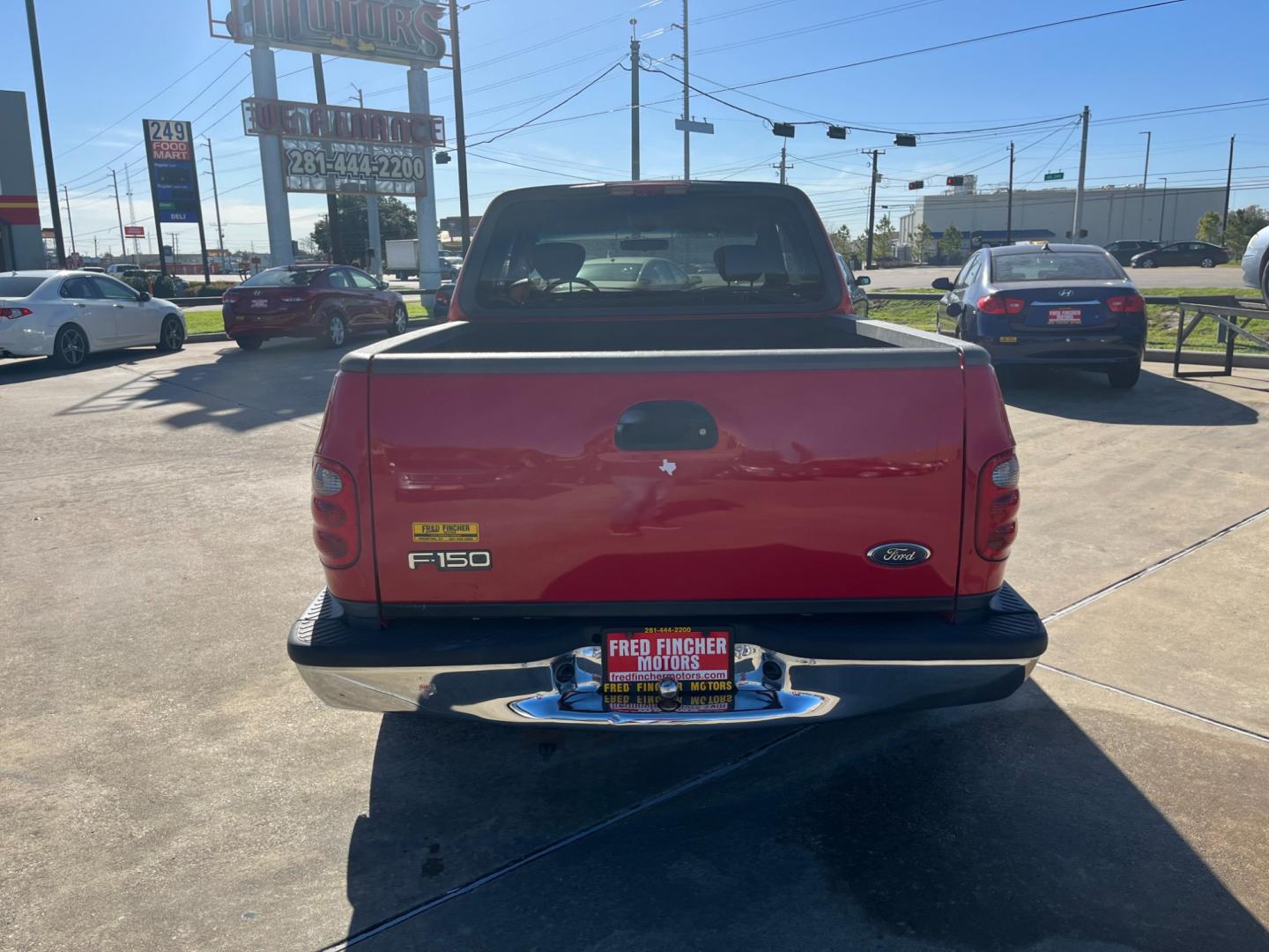 2003 red /TAN Ford F-150 XL SuperCab Flareside 2WD (1FTRX07213K) with an 4.2L V6 OHV 12V engine, Automatic transmission, located at 14700 Tomball Parkway 249, Houston, TX, 77086, (281) 444-2200, 29.928619, -95.504074 - Photo#5